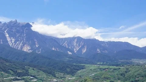 Mount Kinabalu time lapse camera pan from left to right Stock Footage 51667250