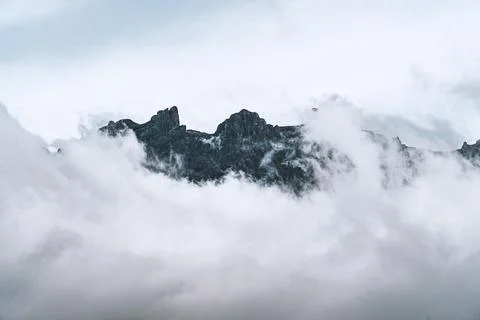 Mount Kota Kinabalu surrounded by clouds Stock Photos