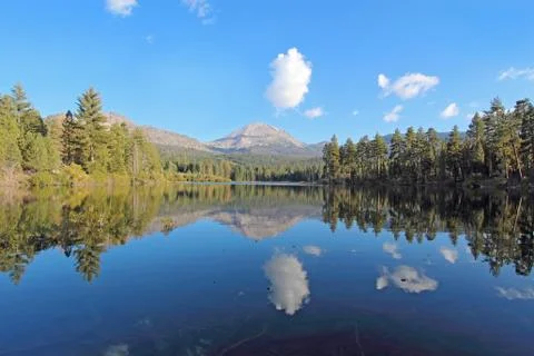 Mount lassen and clouds reflected in manzanita lake Stock Photos