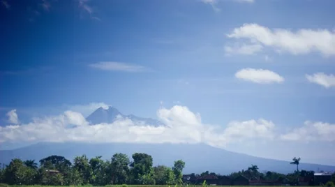 Mount Merapi and Cloud Timelapse in Sunny Day.mp4 Video stock 50364532