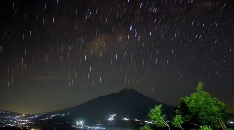 Mount Merapi and Star Trails Comet mode night timelapse Video stock 51414722