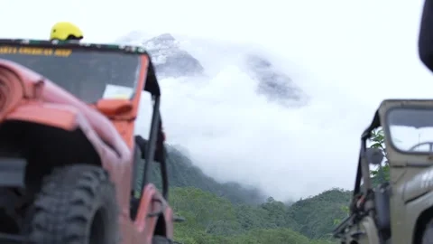 Mount Merapi erupting at sunrise Stock Footage 332532426