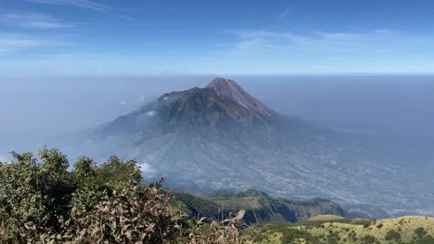 Mount Merapi Volcano seen afar from Mount Merbabu Stock-Footage 346838509