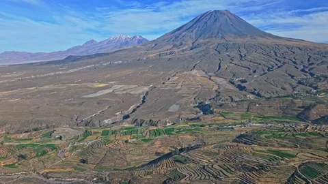 Mount Misti Lava Flows Meet Terraced Farmland Below With Chachani In Stock Footage 327419052