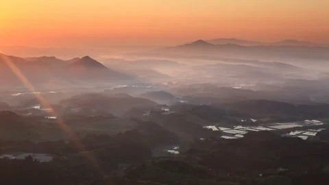 Mount Nakui and the Mountain Range towards Senb_zan with the Morning Sun 스톡 동영상 330209645