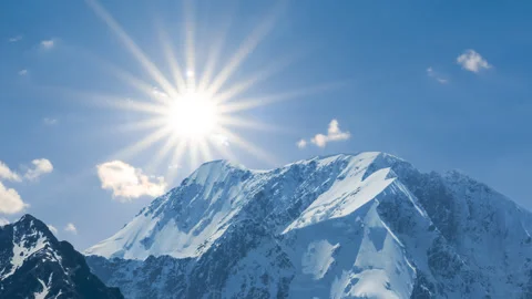 Mount peak in snow under sparkle sun Stock Footage 342099085