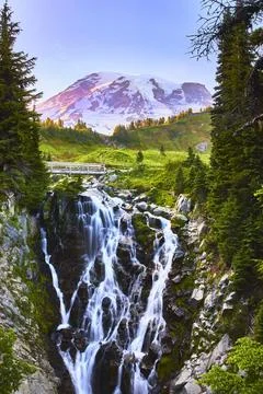 Mount Rainier Myrtle Falls Waterfall and Scenic Bridge at Sunrise in Washingt Stock Photos