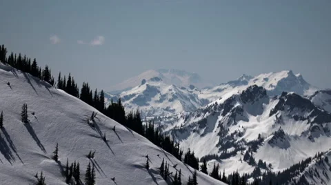 Mount Rainier: Panning Across Snow Capped mountains In Spring Stock Footage 62271359