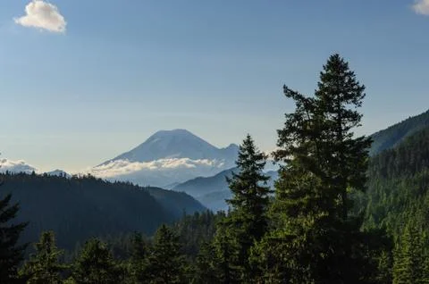 Mount Rainier shrouded in Clouds Stock Photos
