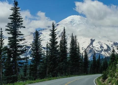 Mount Rainier shrouded in Clouds Stock Photos