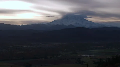 Mount Rainier Silhouette Under Dramatic Cloud Cover Stock Footage 294670554