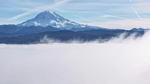 Mount Rainier Towering Above a Cloud Blanket Stock Footage 295186504