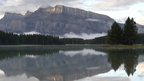 Mount Rundle and Two Jack Lake with early morning mood, Banff National Park, Stock Footage 118740777