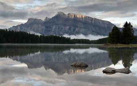Mount Rundle and Two Jack Lake with early morning mood, Banff National Par... Stock Photos