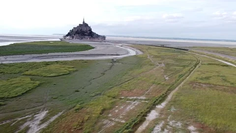 Mount Saint Michel drone shot with road in FG Video stock 161265611