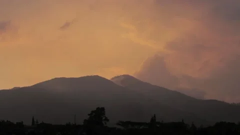 Mount Salak an eroded volcano in West Java Indonesia during Sunset Stock Footage 197481915