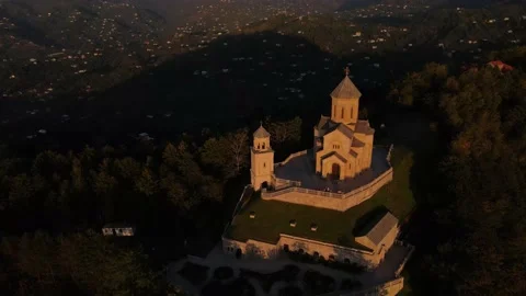 Mount Sameba with the Holy Trinity Cathedral on top, sunset, Georgia, 4k Stock Footage 167362097