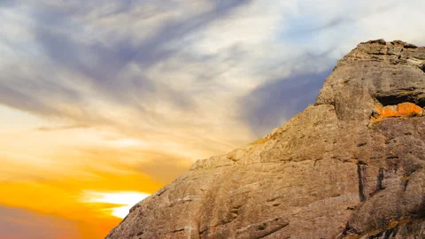 Mount slope in a light of evening sun time lapse scene Stock Footage 169634016