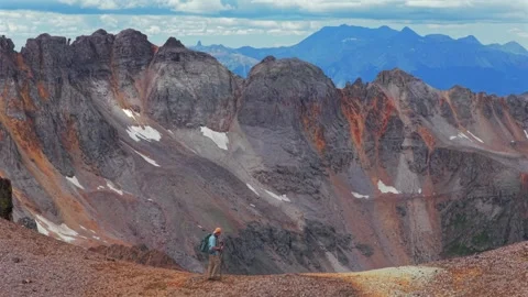 Mount Sneffels 14er peak Wilderness hiker with poles South Slope saddle of Stock Footage 346069532