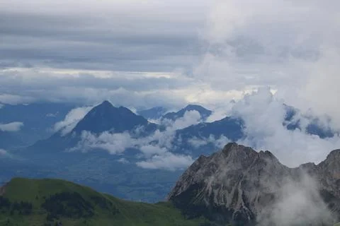 Mount Stanserhorn surrounded by clouds. Stock Photos