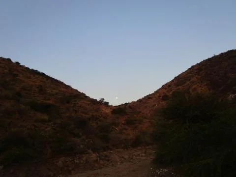 Mount the sun between Stock Photos