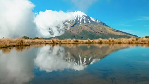 Mount Taranaki with water reflection Stock Footage 260368457