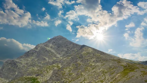 Mount top in light of sparkle sun Stock Footage 314793858