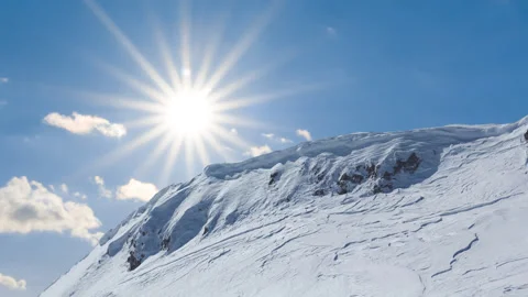 Mount top in a snow time lapse scene Stock Footage 169244562