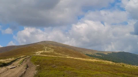 Mount top under a cloudy sky, time lapse scene Stock Footage 125470439