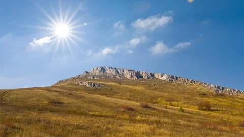 Mount top under a sparkle sun Stock Footage 327319557
