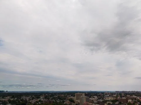 Mount Vernon cityscape under cloudy sky with urban and suburban views, New York Фото