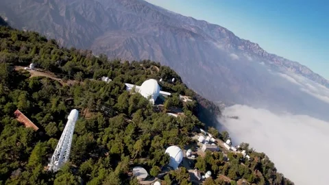 Mount Wilson Observatory Domes Above Clouds, Banked Aerial Flyover, 4K Stock Footage 153052150