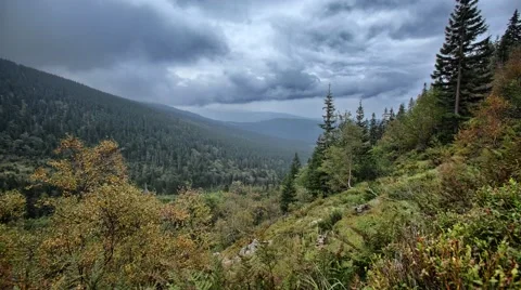 Mountain 4K timelapse with forest and cloudy sky 스톡 동영상 67896877