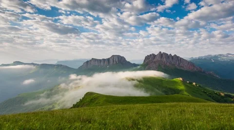Mountain Achishboki under the ripples of clouds and fog. Stock-Footage 52579879