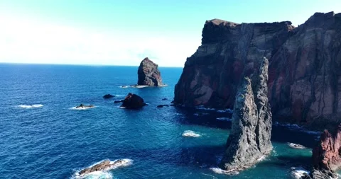 Mountain aerials cliffs aerials of Ponta do Rosto wind mills and rock formation Stock Footage 168218870