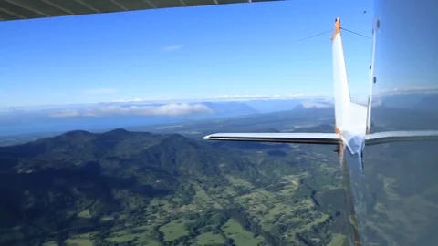 Mountain from aircraft tail Stock Footage 77052993