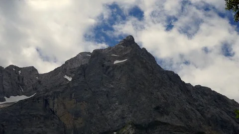 Mountain in the Alps with slow moving clouds Видео 92215372