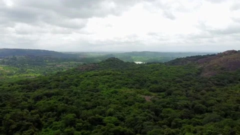 Mountain and cloud green trees panning drone shot Stock Footage 220739707