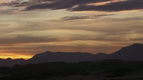 Mountain and Clouds Sunset timelapse Stock Footage 219123363