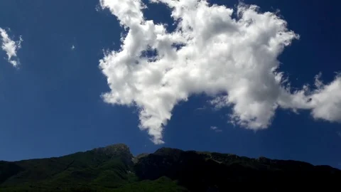 Mountain and Clouds in time lapse Stock Footage 77650990