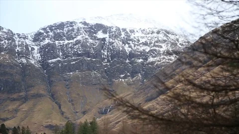 Mountain and tree right pan Stock Footage 122122697