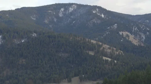 Mountain and valley pan down 動画素材 24753323