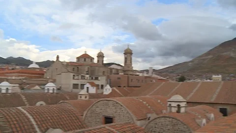 A mountain at the background of a city with red roofs Stock Footage 108875355