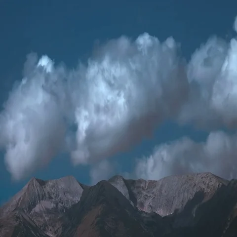 The mountain on the background of the cloud stream. Wide angle. Time lapse Stock Footage 69497134