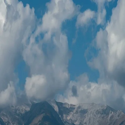 The mountain on the background of the cloud stream. Wide angle. Time lapse Stock Footage 69498980