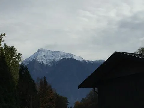 Mountain behind a cabin Stock Photos