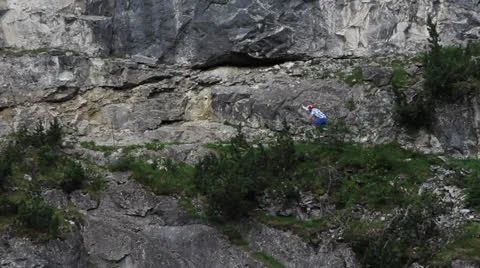 Mountain bike downhill on edge of cliff Stock Footage 23006953