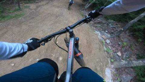 Mountain bike train down the hill with friends Stock Footage 93748063