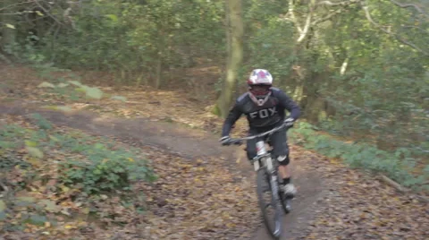 Mountain Biker around Corner - Mid Panning Shot - Shot 3 of 5 Stock Footage 63332168