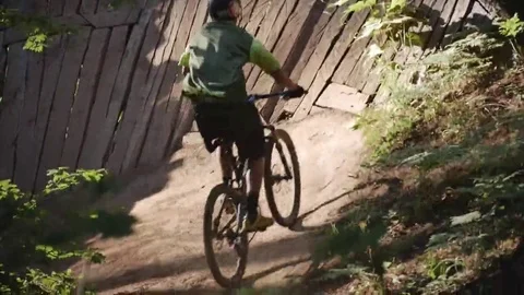 Mountain biker going up a side ramp in Post Canyon. Stock Footage 69180045